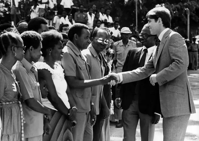 Framed Print : Prince Andrew at Dar Es Salaam during a visit to East Africa shaking hands with students Framed Print : Prince Andrew at Dar Es Salaam during a visit to East Africa shaking hands with students