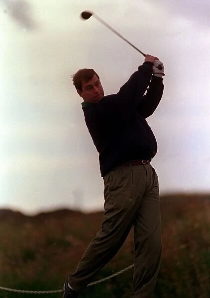 Prince Andrew playing golf August 1993