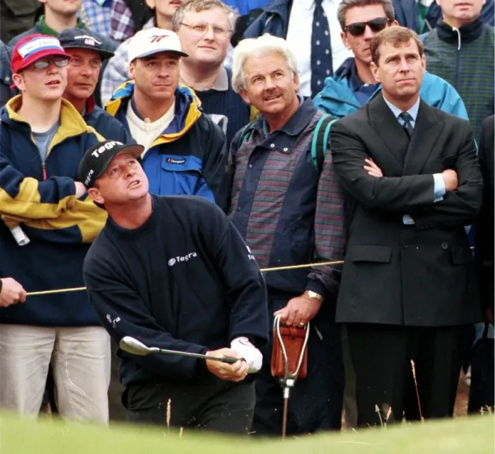 Framed Print : Prince Andrew watches Ian Woosham play out of a bunker during the third round of the Open Framed Print : Prince Andrew watches Ian Woosham play out of a bunker during the third round of the Open