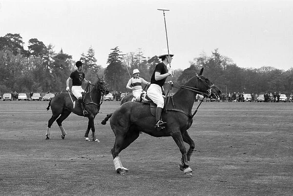 Prince Charles in action during his first polo game at Windsor Park alongside his father