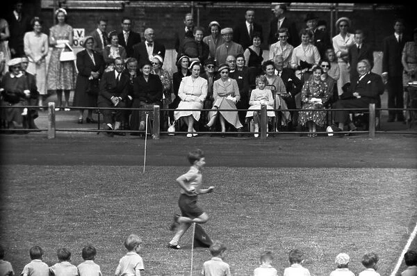 Prince Charles aged 9 at school sports day running, watched by Queen Elizabeth