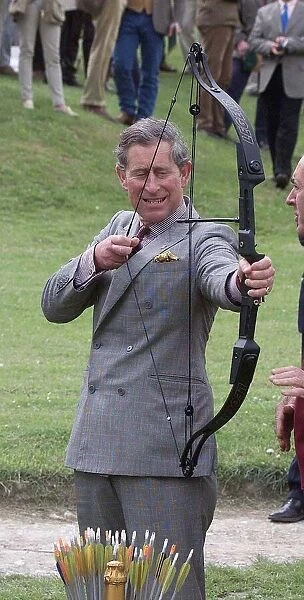 Prince Charles has a go at Archery during visit to Clay Pigeon Shoot in aid of Princes