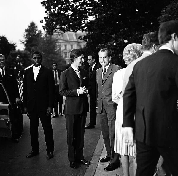 Prince Charles departs the White House, watched by President Richard Nixon and family