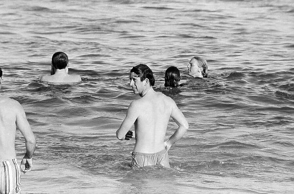 Prince Charles enjoying some time at the beach during his visit to Australia. March 1979