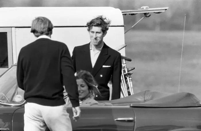 Framed Print : Prince Charles goes for a drive in his Aston Martin with a mystery girl companion Framed Print : Prince Charles goes for a drive in his Aston Martin with a mystery girl companion
