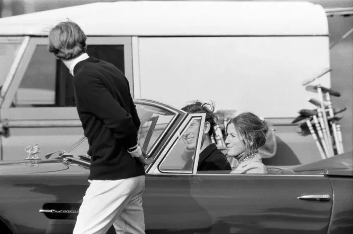Framed Print : Prince Charles goes for a drive in his Aston Martin with a mystery girl companion Framed Print : Prince Charles goes for a drive in his Aston Martin with a mystery girl companion