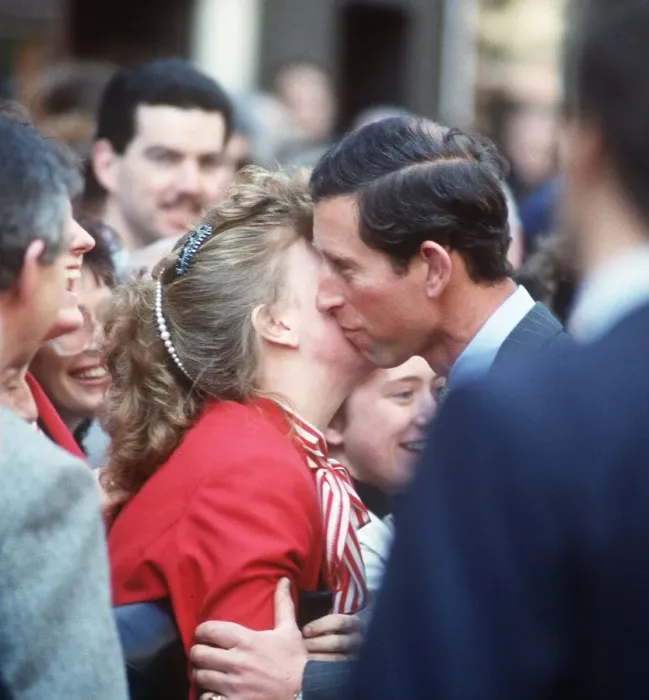 Framed Print : Prince Charles kissing girl on walkabout at the Glasgow Garden Festival 1988