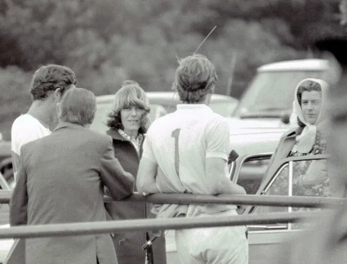 Framed Print : Prince Charles leans back on to railings as he chats with Camilla Parker Bowles during a Framed Print : Prince Charles leans back on to railings as he chats with Camilla Parker Bowles during a