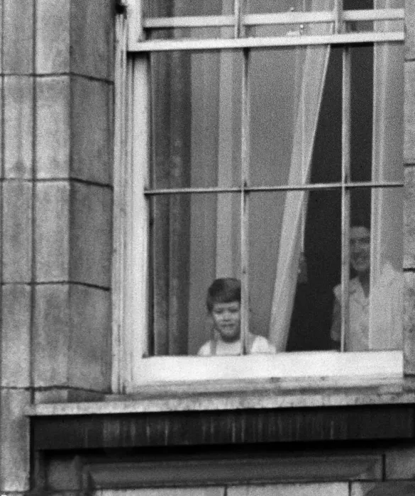 Framed Print : Prince Charles looks out of a window at Buckingham Palace to see the crowds Framed Print : Prince Charles looks out of a window at Buckingham Palace to see the crowds