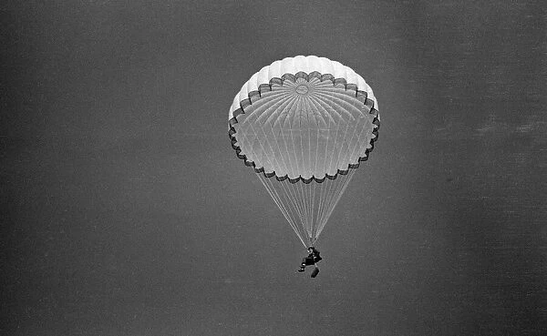 Prince Charles makes a parachute jump off the Dorset coast during his training as an RAF