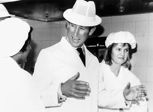 Prince Charles opens a business training centre in white overalls and hat May 1988