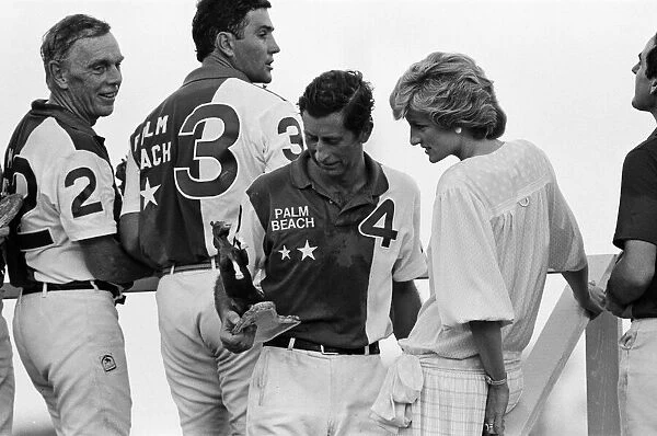 Prince Charles, Prince of Wales and Diana, Princess of Wales attend a polo match at Palm