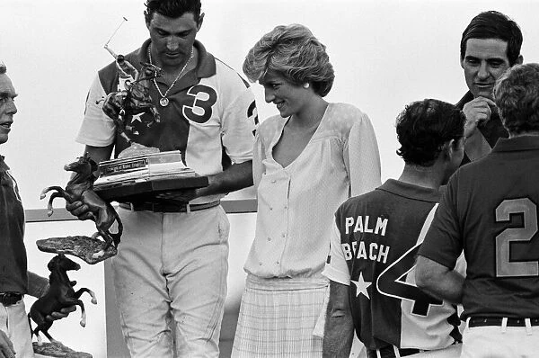 Prince Charles, Prince of Wales and Diana, Princess of Wales attend a polo match at Palm