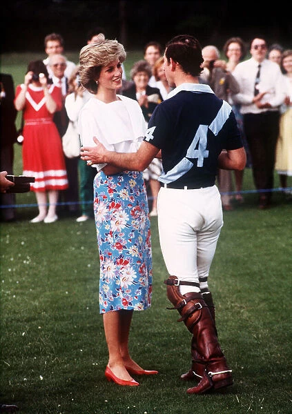 Prince Charles, Prince of Wales and Princess Diana, Princess of Wales attend a polo