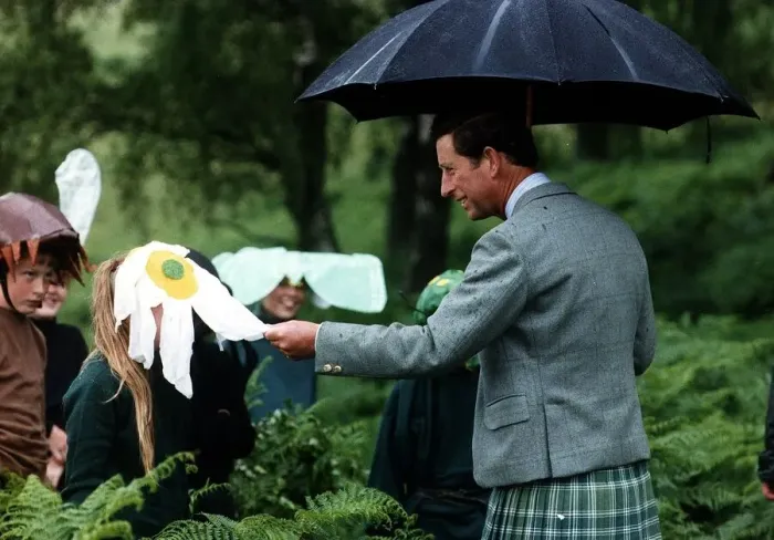 Framed Print : Prince Charles Prince of Wales umbrella kilt children dressed as flowers Framed Print : Prince Charles Prince of Wales umbrella kilt children dressed as flowers