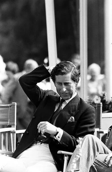 Prince Charles, Prince of Wales watching polo at Windsor, Berkshire. 27th June 1980