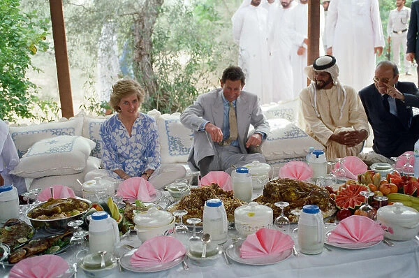 Prince Charles and Princess Diana attend a picnic in the desert at Al Ain