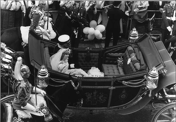 Prince Charles and Princess Diana drive along Fleet Street on their way to Buckingham