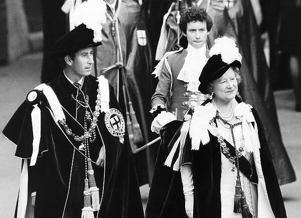 Prince Charles and the Queen mother wearing robes-a suit and a dress October 1978