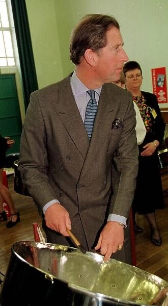 Prince Charles on a school visit in Norwich, March 1998 Playing steel drum