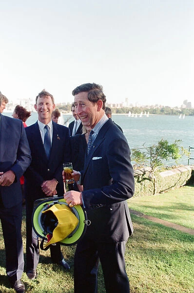 Prince Charles in Sydney, pictured holding a fire fighters helmet. Sydney, Australia