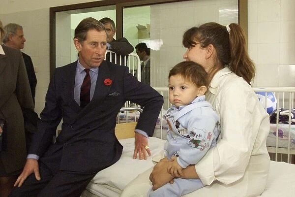 Prince Charles talks to Ianka Konstantinov and her baby son Bojidar aged 1