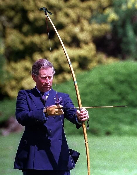 Prince Charles tries his hand at Archery June 1999 with the Royal Company of Archers The