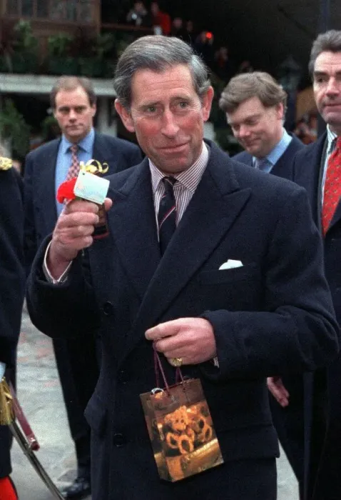 Framed Print : Prince Charles with unexpected birthday presents as he arrives at Tower Pier for lunch Framed Print : Prince Charles with unexpected birthday presents as he arrives at Tower Pier for lunch