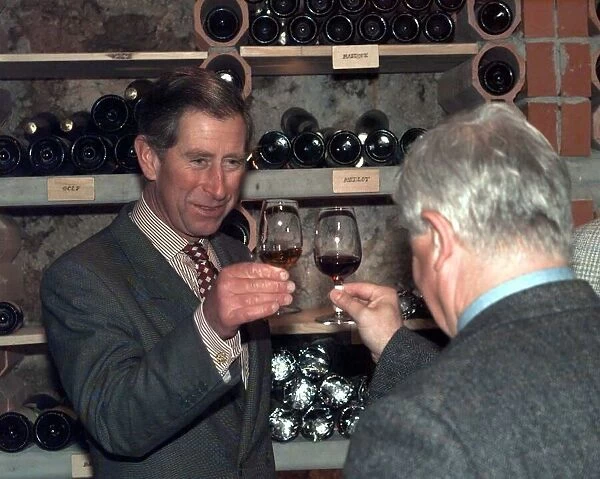 Prince Charles visiting Slovenia sampling brandy wine at the Triglav National Park in