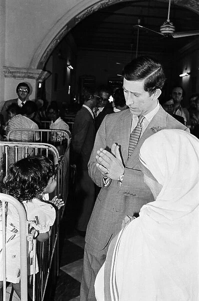Prince Charles visits Mother Teresa at her institution in Calcutta, India. December 1980