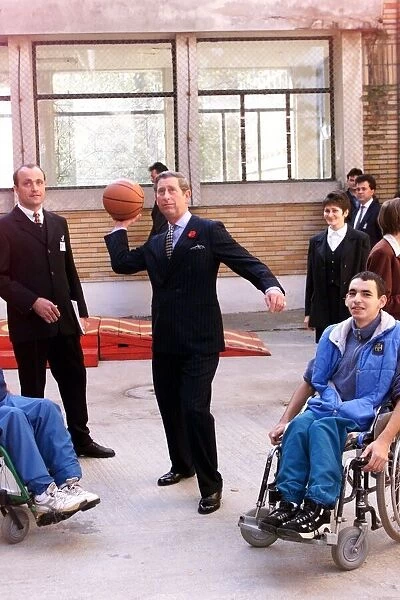 Prince Charles Visits Romania November 1998 playing basketball at Wheelchair Centre