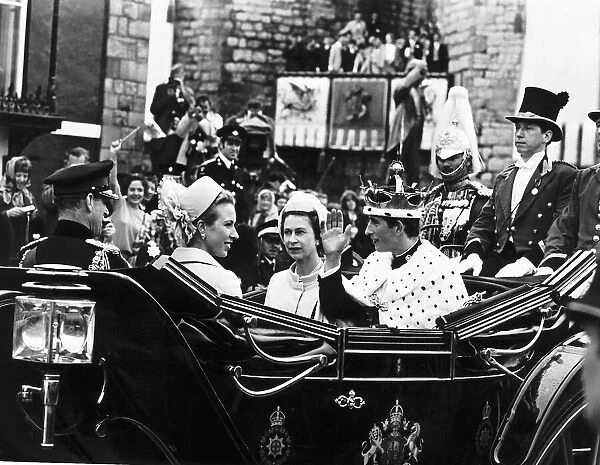 Prince Charles Wearing his coronet and robes, the newly invested Prince of Wales drives