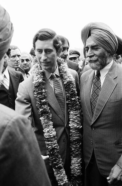 Prince Charles wearing a garland upon his arrival at Amritsar Airport. 28th November 1980