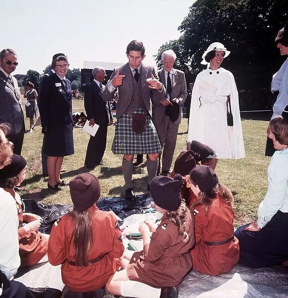 Prince Charles wears kilt whilst talking to Brownies in 1977