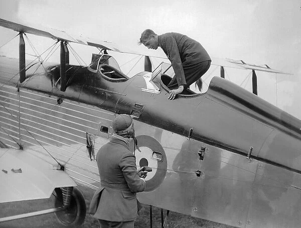 Prince George gets out of the cockpit of an RAF plane after flying to Hull. October 1929