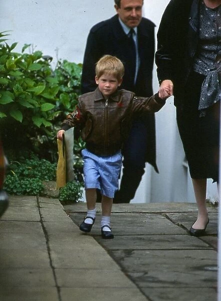 Prince Harry May 1988 going back to school after an operation leather jacket shorts