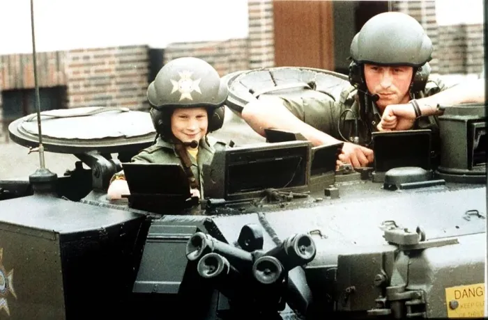 Framed Print : Prince Harry riding in a British Army light tank during a visit to the barracks of Framed Print : Prince Harry riding in a British Army light tank during a visit to the barracks of