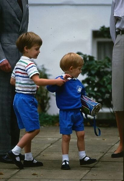 Prince Harry September 1987 wearing a blue sweatshirt shorts