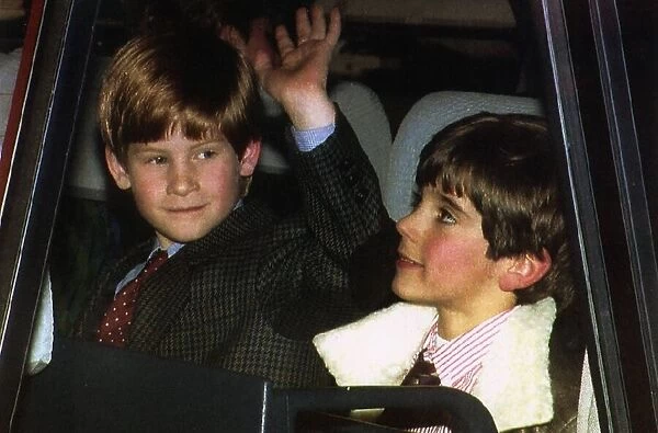 Prince Harry waves at press as he arrives Zurich airport with friend George Gruber