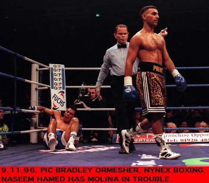 Framed Print : Prince Naseem Hamed Boxer and WBO Featherweight Champion walks towards his own corner Framed Print : Prince Naseem Hamed Boxer and WBO Featherweight Champion walks towards his own corner