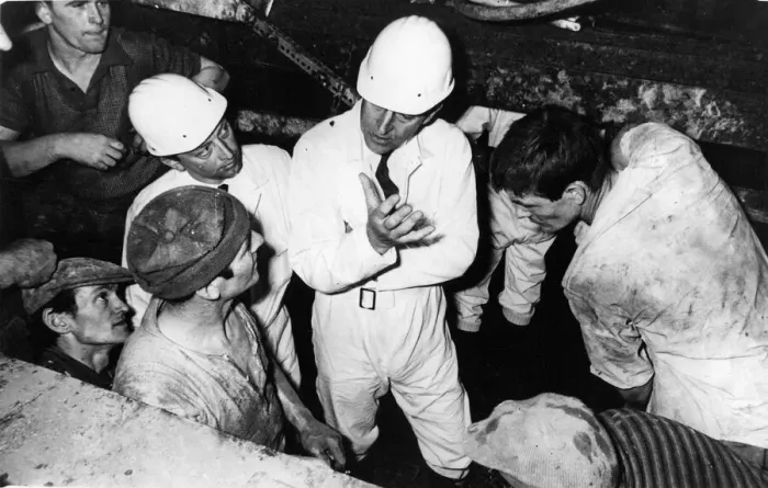 Framed Print : Prince Philip, Duke of Edinburgh, chats to a group of workers on his visit to the tunnel