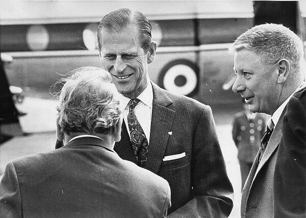 Prince Philip, Duke of Edinburgh, lands at Usworth Airport and is greeted by Mrs C Bacon