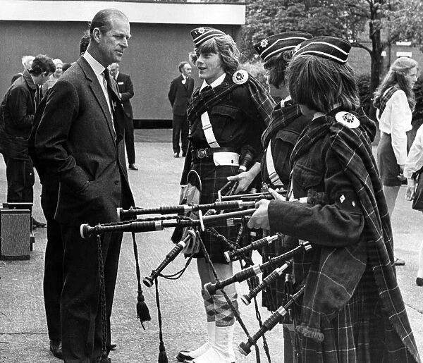 Prince Philip, Duke of Edinburgh, North West visits. The Duke chats to three pipers of