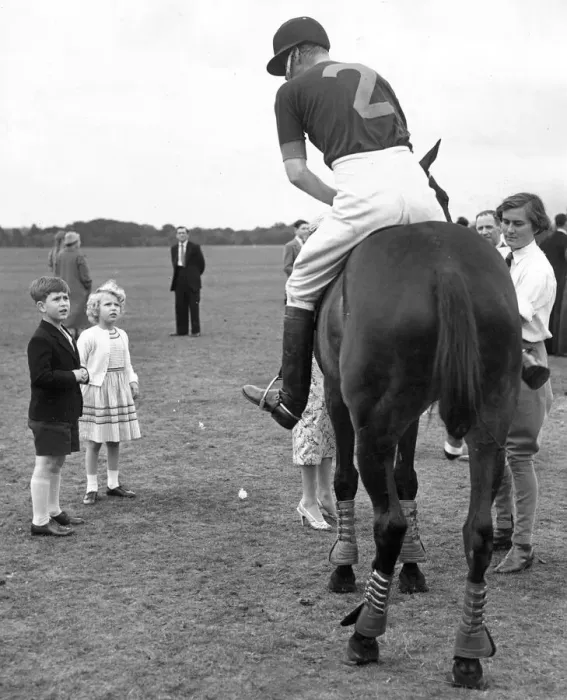 Framed Print : Prince Philip, Duke of Edinburgh, takes a break from the polo match to chat with his son