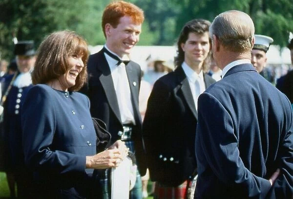 Prince Philip Duke of Edinburgh talking to Diana Rigg. September 1989