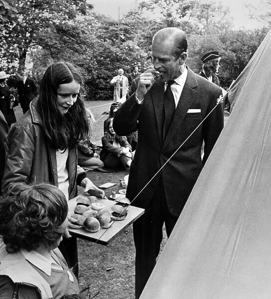 Prince Philip, Duke of Edinburgh, tries Guides beefburgers at Port Sunlight