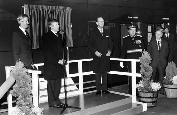 Framed Print : Prince Philip, Duke of Edinburgh, unveils a plaque at the new Travel Centre in Framed Print : Prince Philip, Duke of Edinburgh, unveils a plaque at the new Travel Centre in