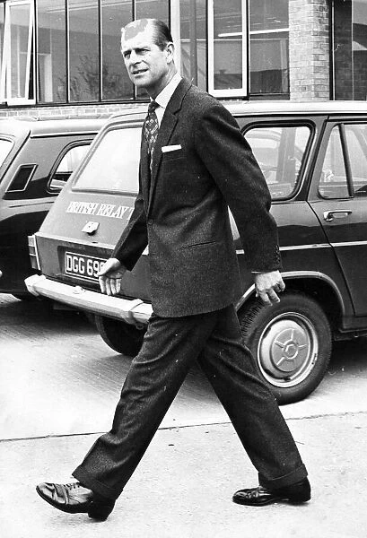 Prince Philip, Duke of Edinburgh, during a visit to the Clan Motor Company Factory
