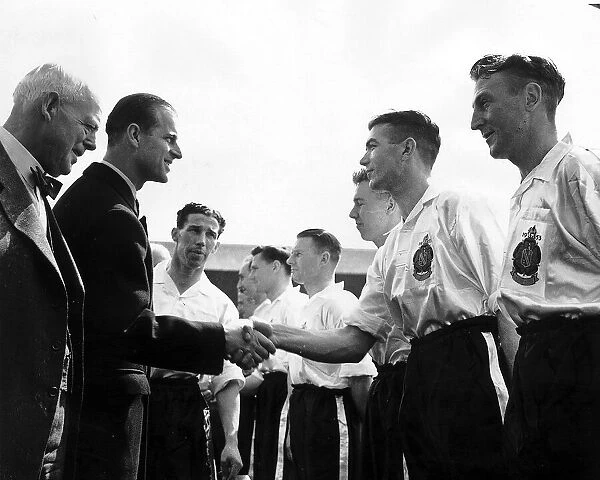Prince Philip meets the Bolton Wanderers team before the 1953 FA Cup Final between