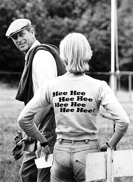 Prince Philip meets a girl wearing a funny tee-shirt